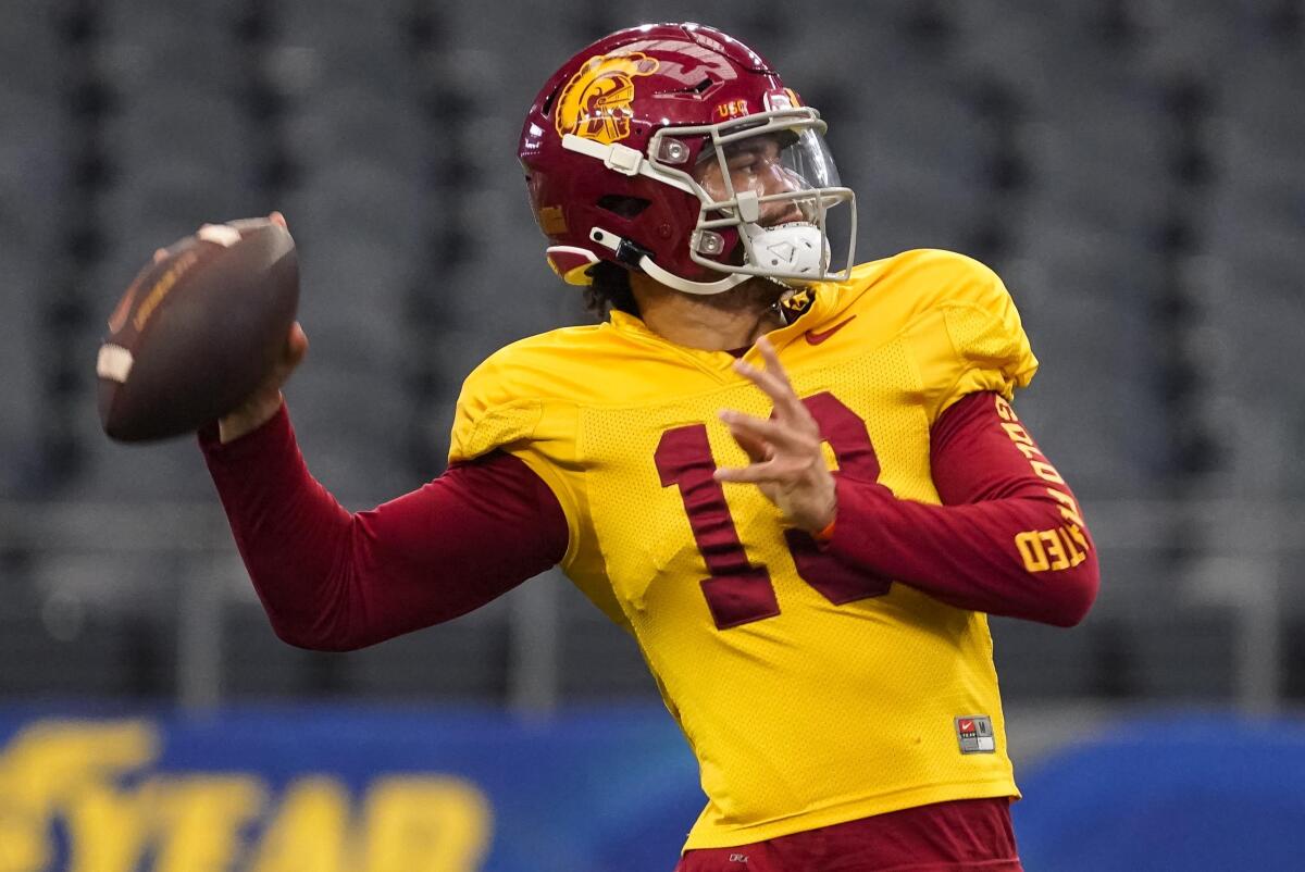 USC quarterback Caleb Williams throws a pass during a Cotton Bowl practice session on Thursday.
