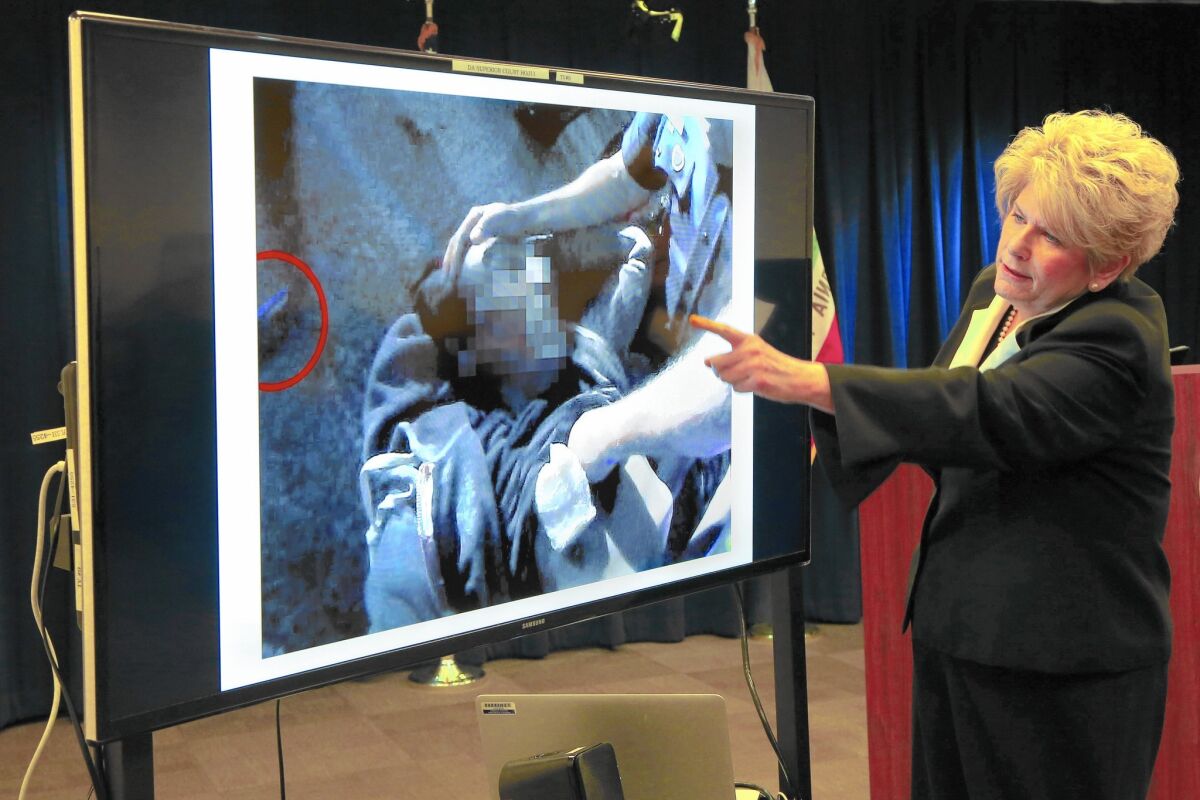 San Diego County Dist. Atty. Bonnie Dumanis with the video of the police shooting released Dec. 22.