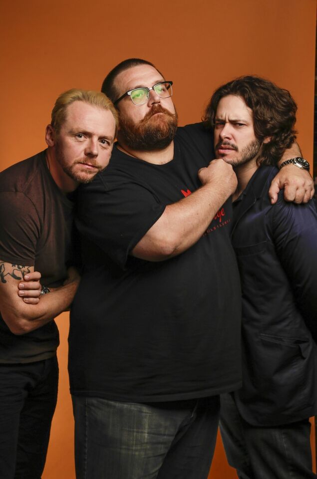 Actors Simon Pegg, left, and Nick Frost with director Edgar Wright, right, join up for the comedy "The World's End."