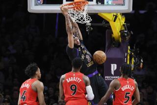 Los Angeles, CA, Tuesday, January 9, 2024 - Los Angeles Lakers forward Anthony Davis (3) slam dunks in the first half against the Toronto Raptors at Crypto.Com Arena. (Robert Gauthier/Los Angeles Times)
