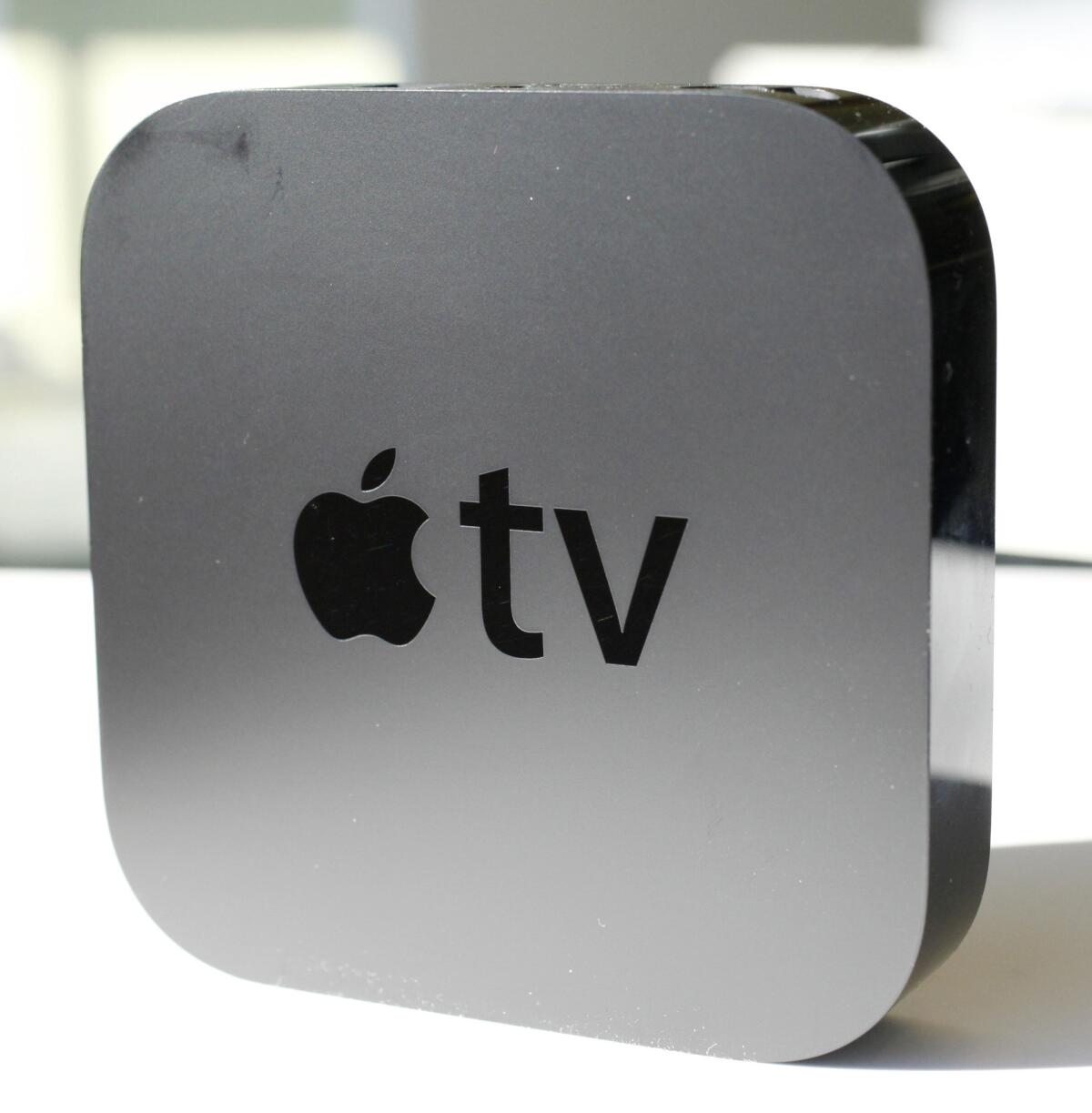 A report Wednesday said new code in Apple's software seems to indicate the tech company will bring Siri to the next version of Apple TV.