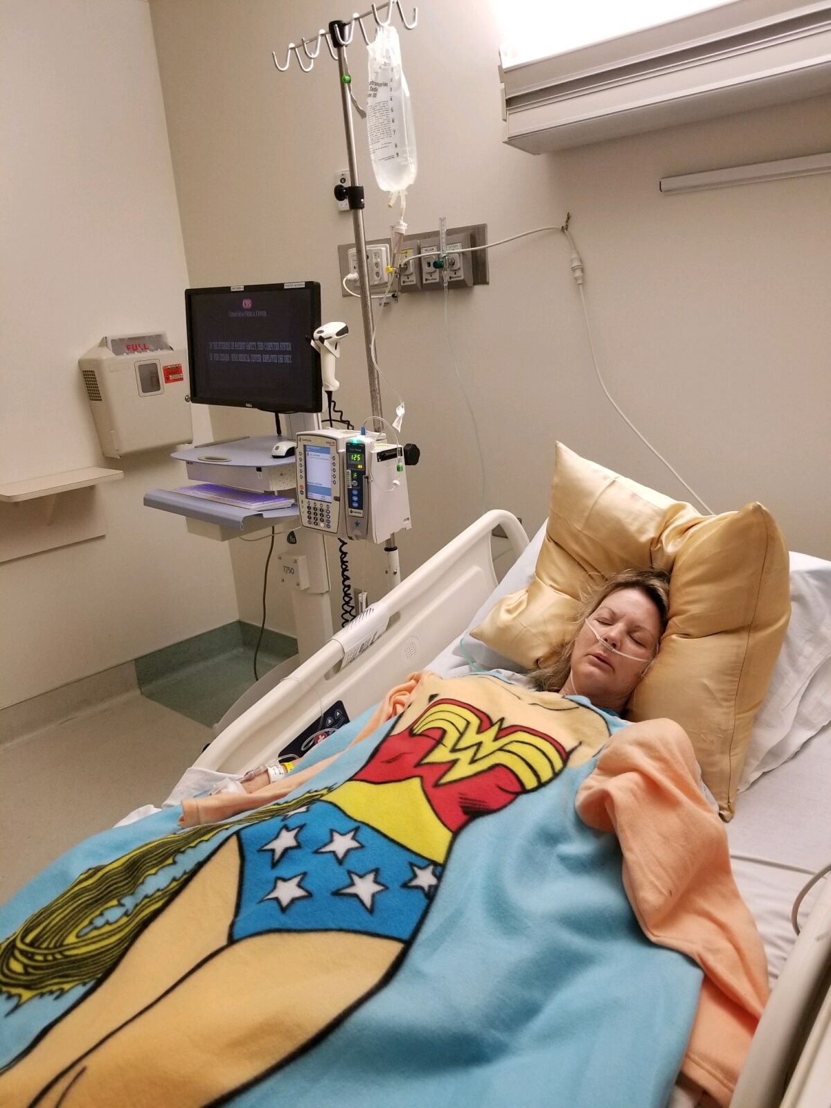 Heidi Miller in hospital bed at Cedars-Sinai awaiting transplant surgery.