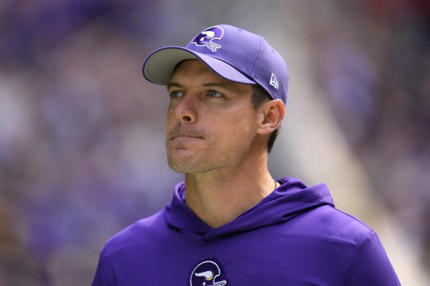 Minnesota Vikings head coach Kevin O'Connell walks onto the field before an NFL football game against the Tampa Bay Buccaneers, Sunday, Sept. 10, 2023, in Minneapolis. (AP Photo/Abbie Parr)