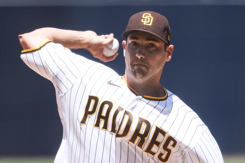 Blossoming Robert Suarez holds the line in Padres' win - The San Diego  Union-Tribune