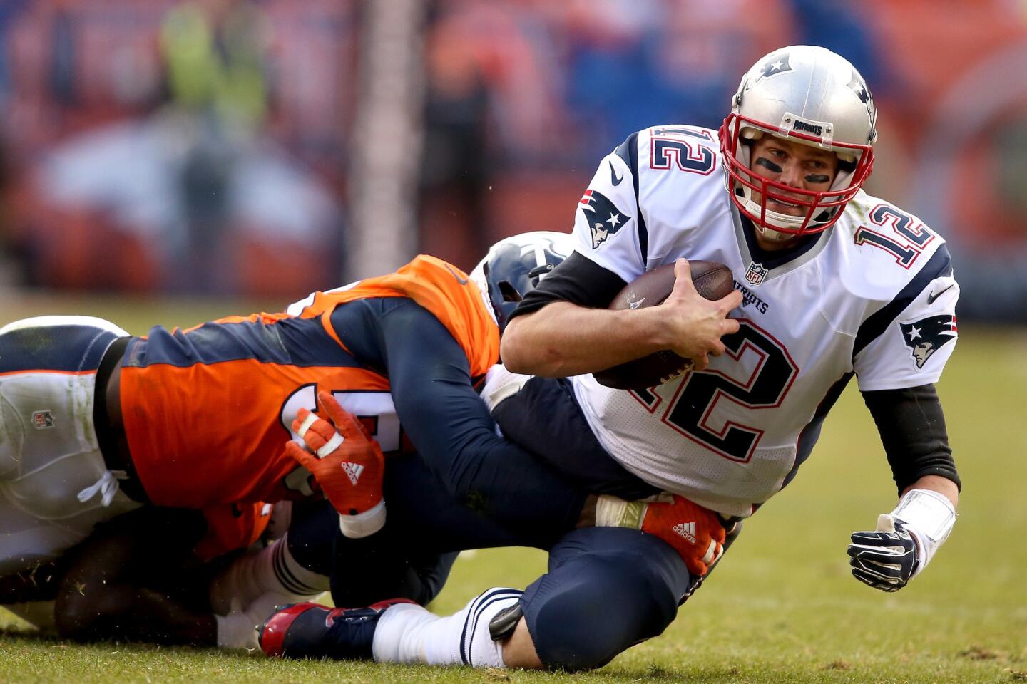 New England quarterback Tom Brady is sacked by Denver linebacker Von MIller during the second quarter of the AFC Championship game on Jan. 24.