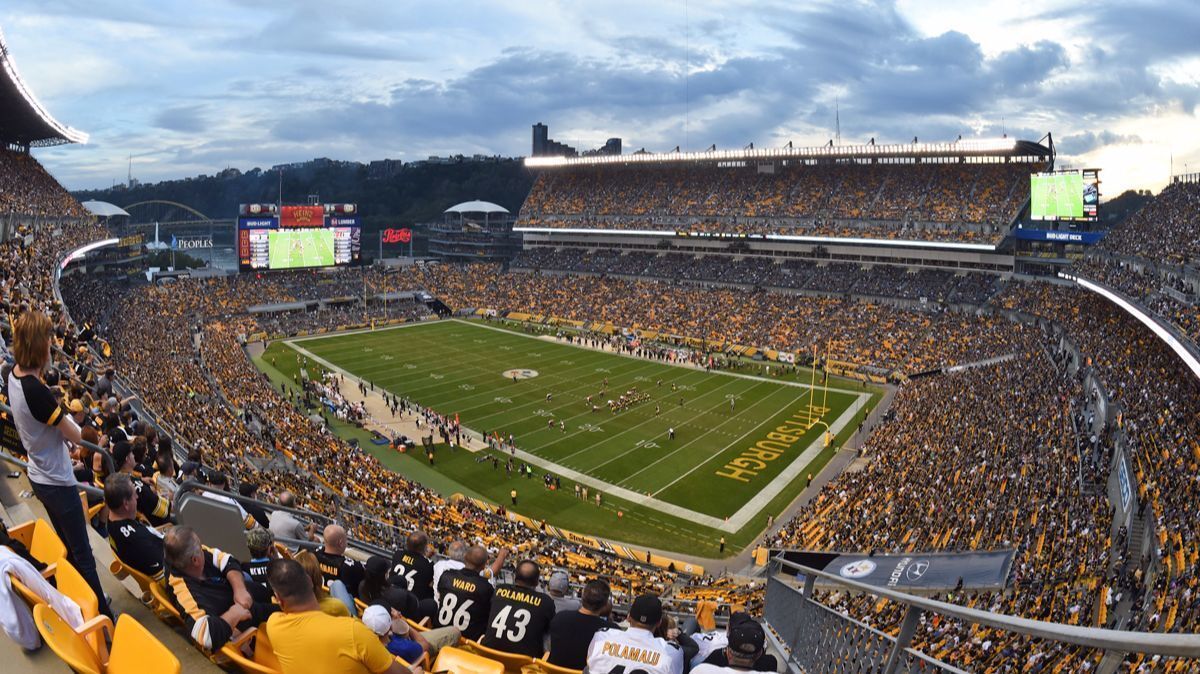 Fans watch a football game between the Pittsburgh Steelers and the Cincinnati Bengals at Heinz Field on Sunday in Pittsburgh.