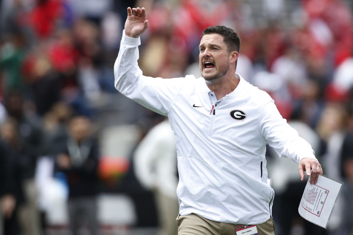 FILE - Georgia defensive coordinator Dan Lanning during warm ups before an NCAA football spring G-Day game in Athens, Ga., on April 20, 2019. Oregon has hired Georgia defensive coordinator Dan Lanning as its next head coach, a person involved in the negotiations told The Associated Press on Saturday, Dec. 11, 2021. (Joshua L. Jones/Athens Banner-Herald via AP, File)