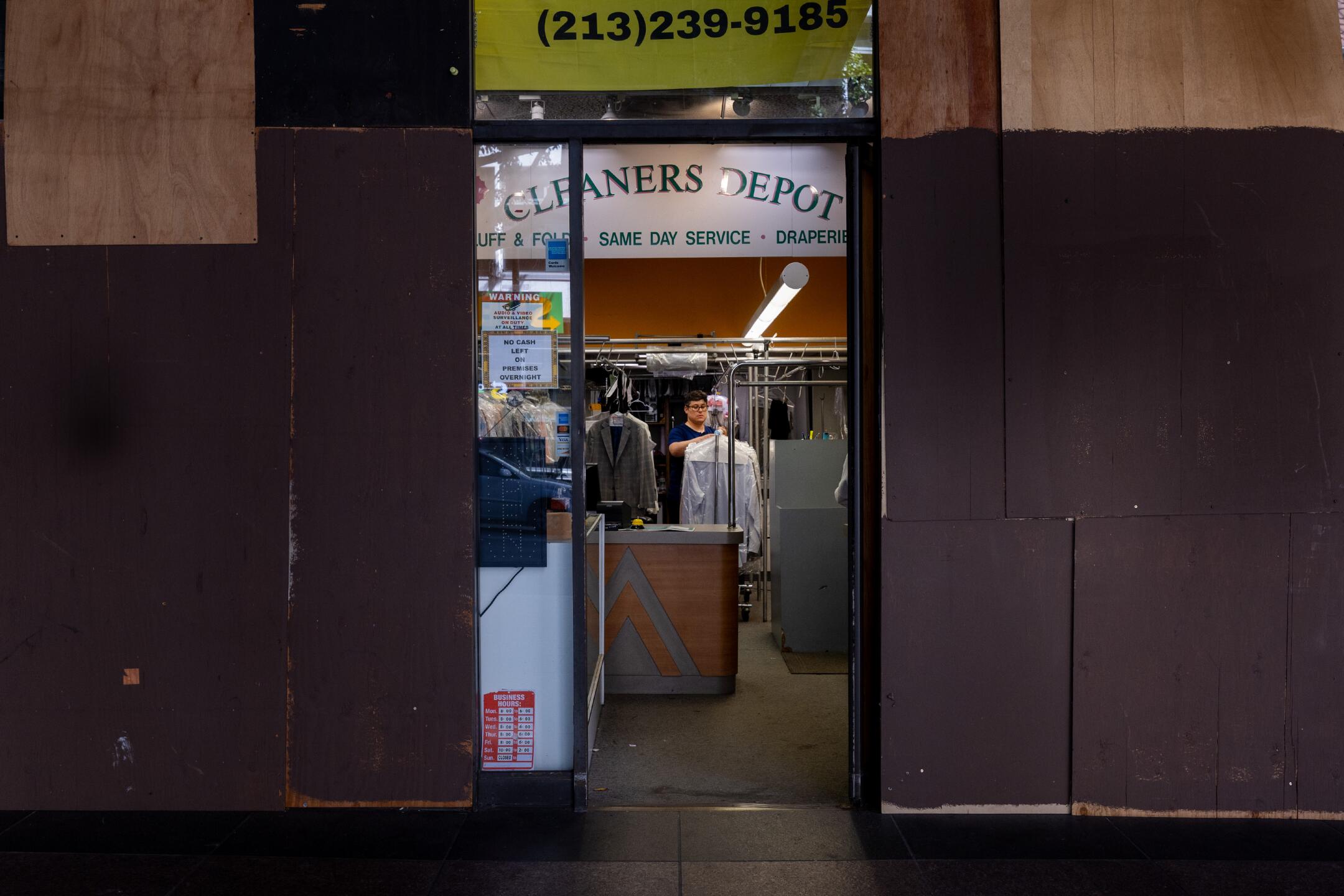 Dry cleaner struggles to survive in empty downtown L.A. skyscraper ...