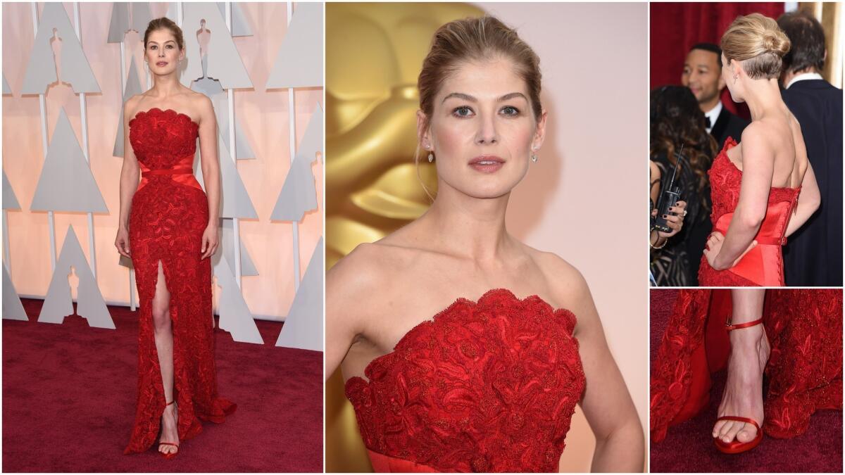 At the 2015 Oscars, Pike appeared in this red Givenchy gown with rose petal-like embroidery.