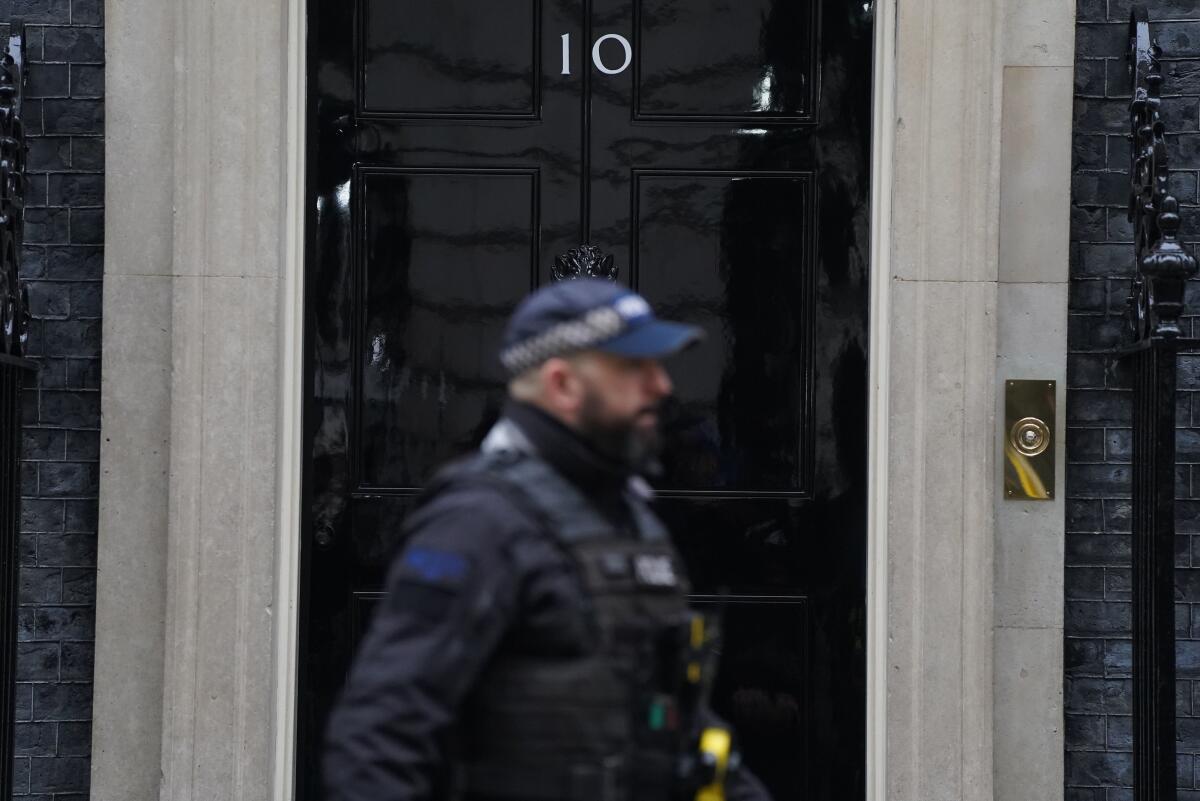 Police officer outside 10 Downing St. in London