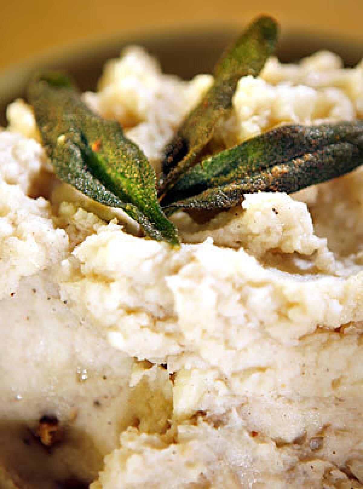 Serve mashed potatoes laced with sage, butter, milk and Greek yogurt.