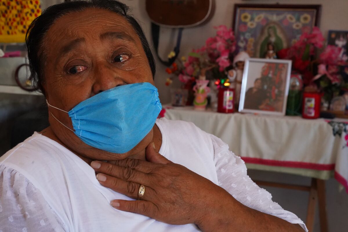 Ausencia Guadalupe Lopez, 73, mourns her daughter, who died of COVID-19.
