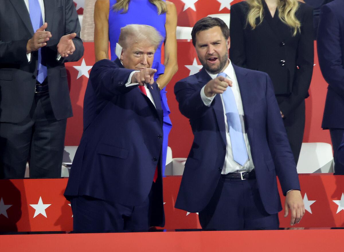 Former President Trump and running mate J.D. Vance at Monday night's session at the Republican National Convention.