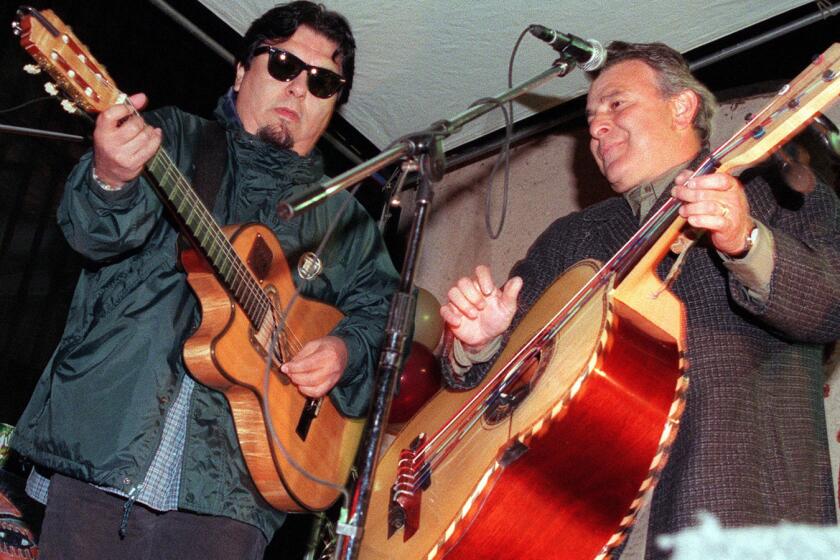 Ceasar Rosas and Conrad Lozano of Los Lobos playing on Feb. 6, 1999.