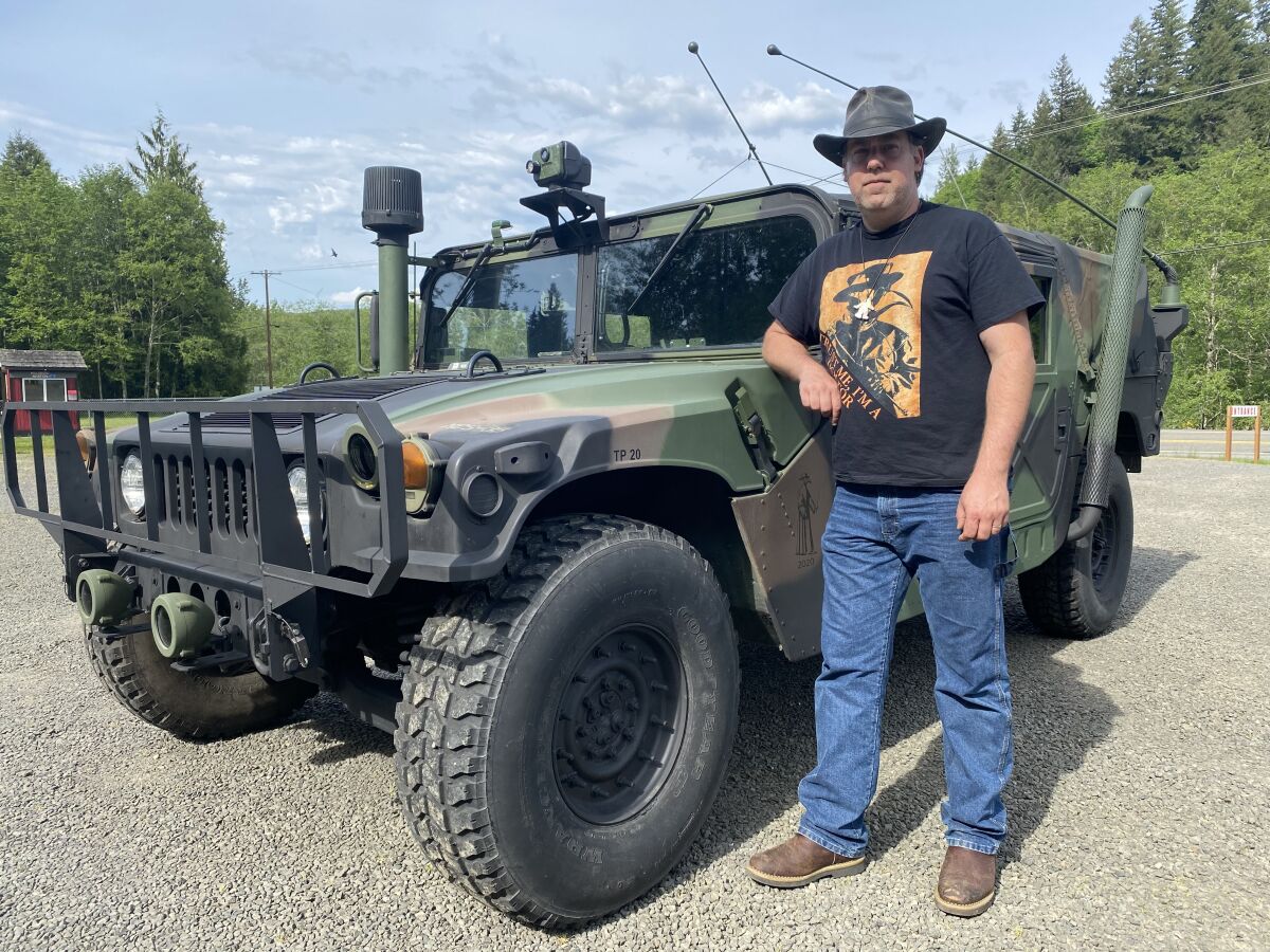 Joe Bongiovanni, of Toutle, Wash., installed thermal imaging equipment in a military Humvee to search for Sasquatch in forests below Mt. St. Helens.
