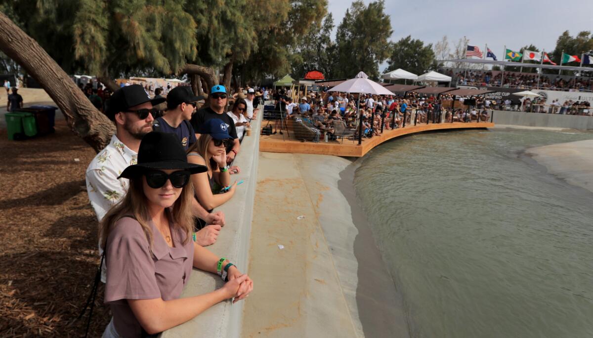 Fans line the Surf Ranch pool to watch pro surfing come to rural California during the first-ever World Surf League Founder's Cup at Kelly Slater's Surf Ranch in Lemoore, CA.