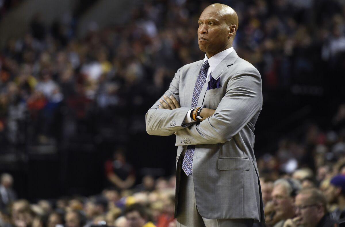 Lakers Coach Byron Scott watches from the sideline during the first half of a game against the Trail Blazers on Jan. 23.