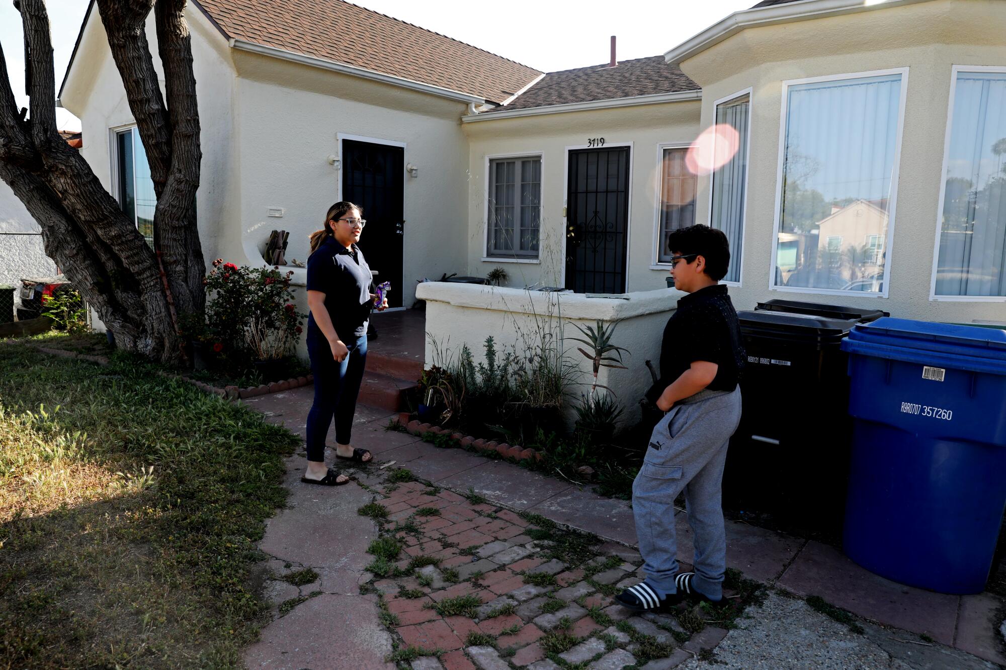 Alondra, 14, left, and brother Jacob, 11.