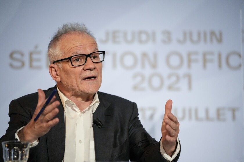 Festival director Thierry Fremaux speaks during the press conference for the presentation of the official selection of the 74th International Cannes Film Festival, in Paris, Thursday, June 3, 2021. (AP Photo/Francois Mori)