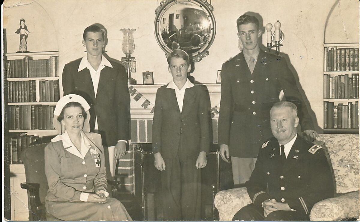 Marnie and Col. William Stewart (seated) pose with Ray, Stan and Bill in 1942 in their newly purchased Barber Tract home.