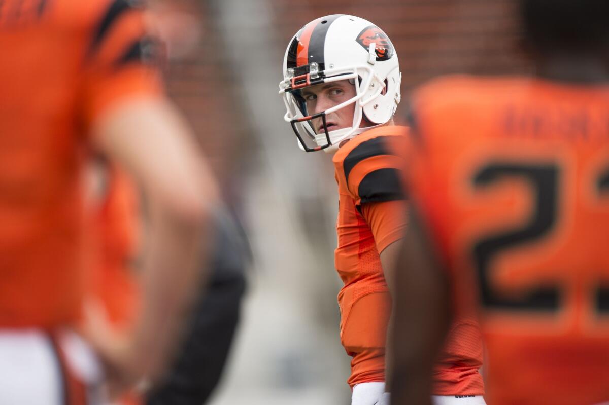 Oregon State quarterback Sean Mannion warms up before a game against Portland State on Aug. 30. Mannion has completed 76 of 113 passes this season for 903 yards and four touchdowns.