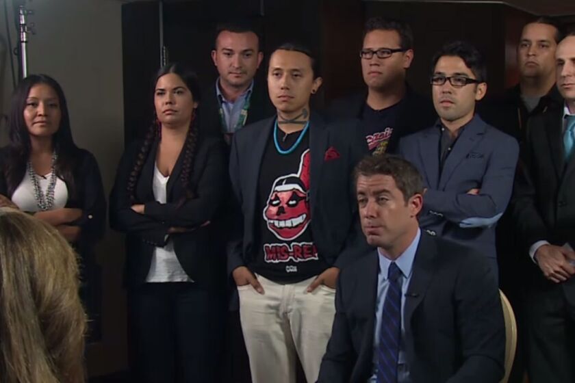 "Daily Show" correspondent Jason Jones and a group of Native Americans who dislike the Washington Redskins name.