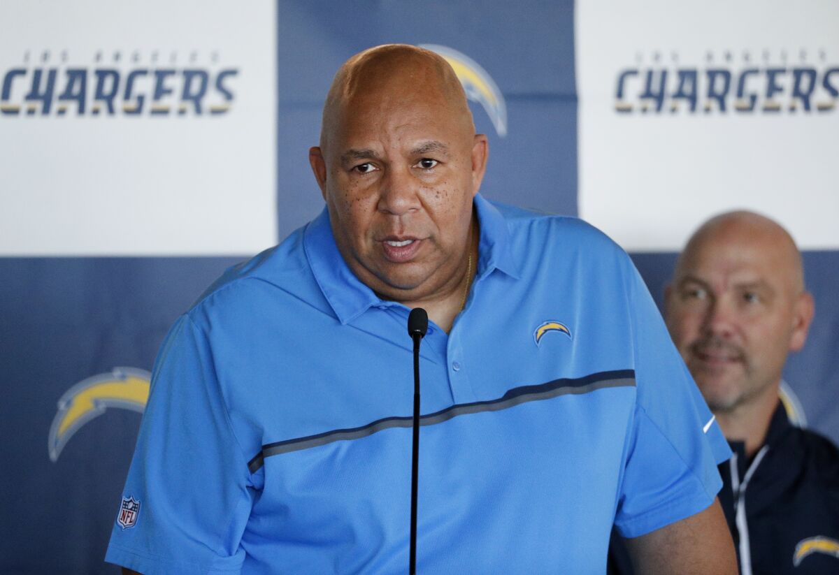 Los Angeles Chargers special team coordinator George Stewart speaks during a news conference.