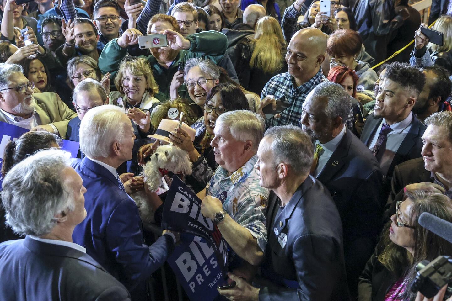 Joe Biden speaks with supporters after his L.A. rally Tuesday night.