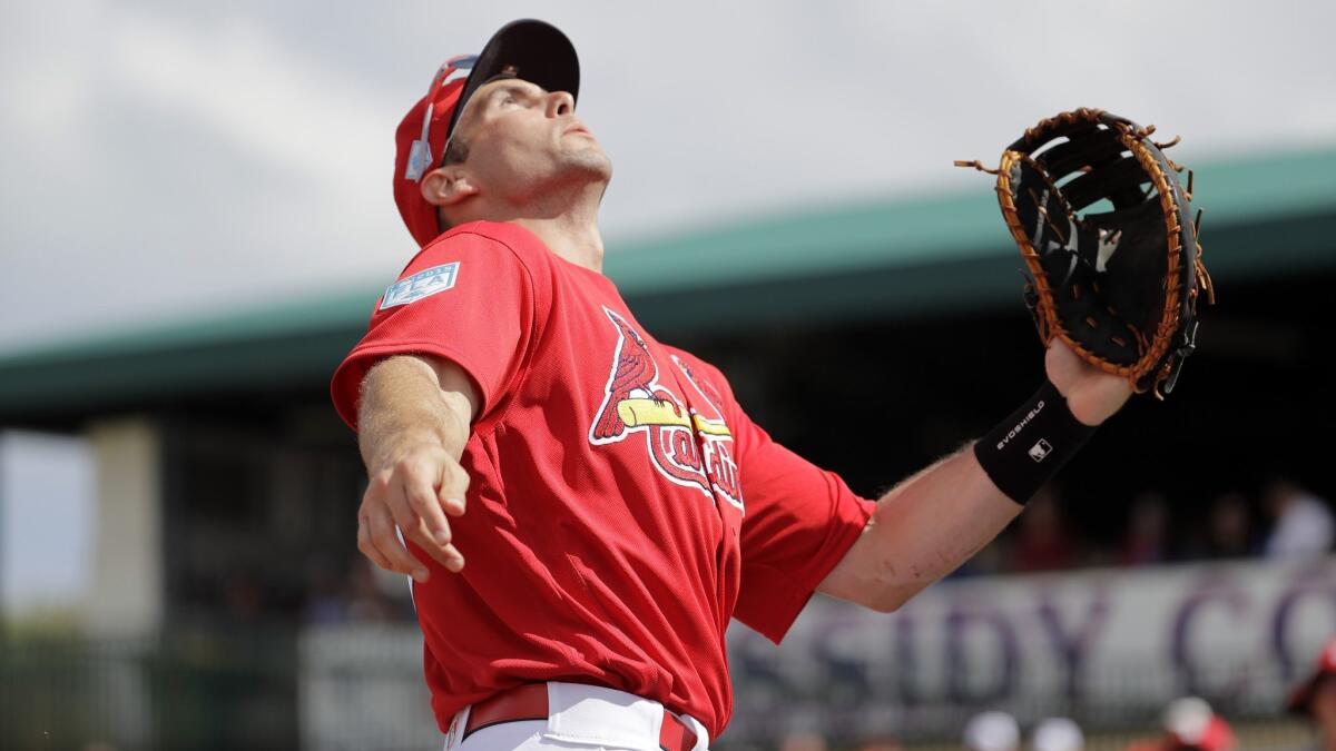 St. Louis first baseman Paul Goldschmidt keeps his eye on a popup during a spring training game against the New York Mets on Feb. 28.