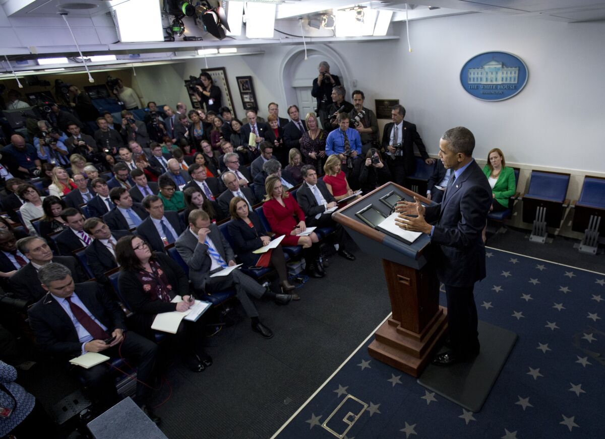 President Obama speaks during a news conference in the White House briefing room on Dec. 18.