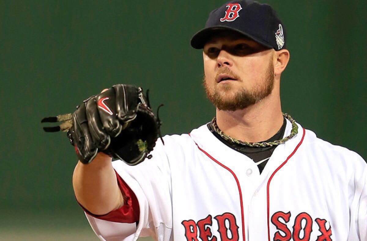 Red Sox starting pitcher Jon Lester had rosin on the inside of his glove during Game 1 of the World Series on Wednesday night.