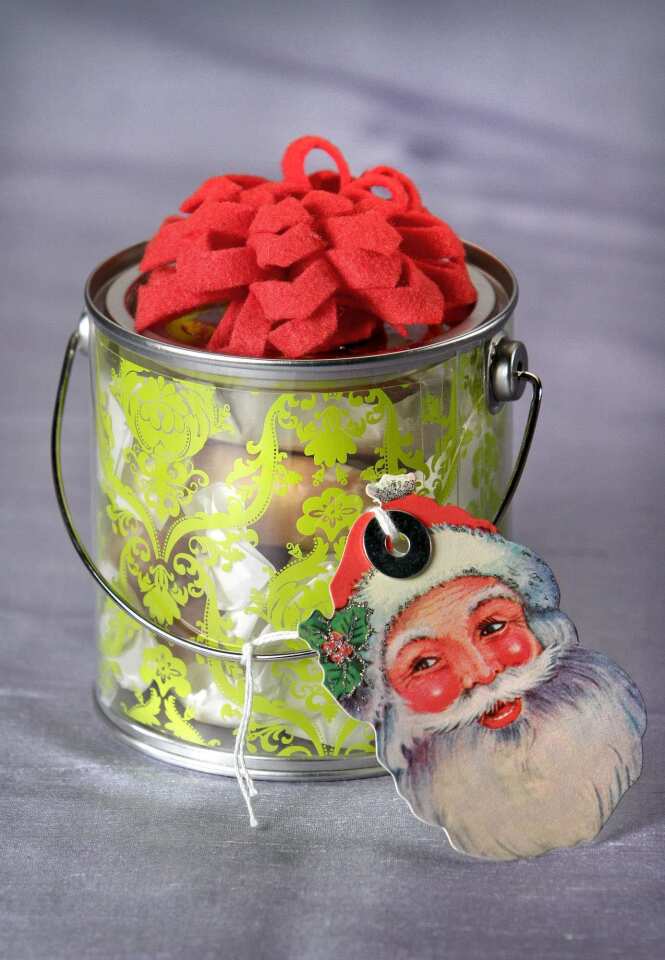 Craft stores, storage-solution stores and salvaged decorations can be resources for enhanced gift packages.