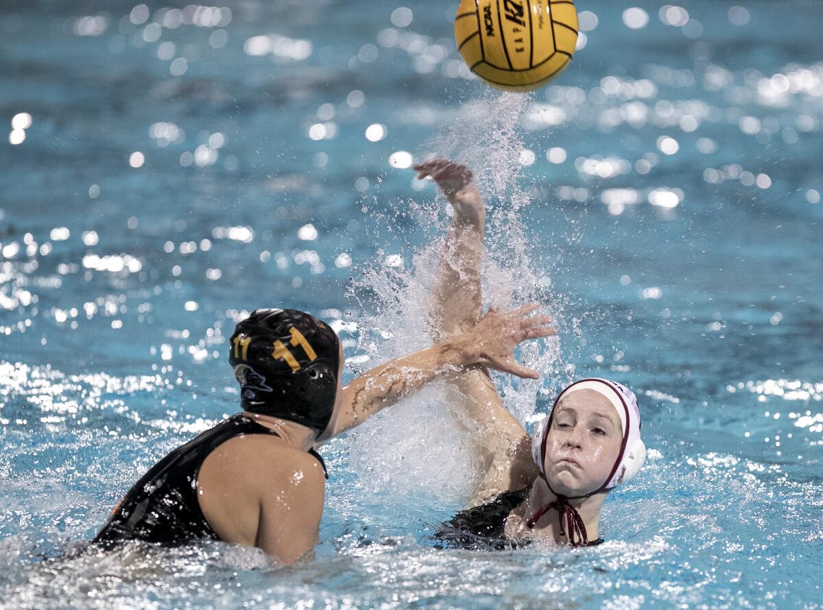 Laguna Beach's Kara Carver takes a shot against Foothill's Peyton Pierson on Wednesday during the Open Division semifinals.