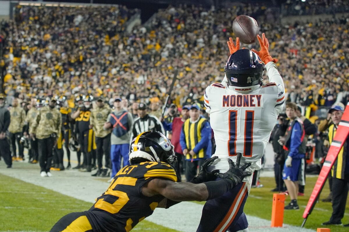 Chicago Bears wide receiver Darnell Mooney (11) makes a touchdown catch past Pittsburgh Steelers cornerback Arthur Maulet (35) during the second half of an NFL football game, Monday, Nov. 8, 2021, in Pittsburgh. The Steelers won 29-27. (AP Photo/Gene J. Puskar)