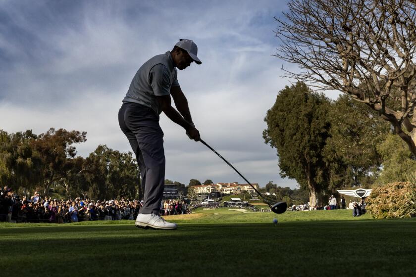 PACIFIC PALISADES, CA - FEBRUARY 18, 2023: Tiger Woods tees off on the 9th hole in the third round.