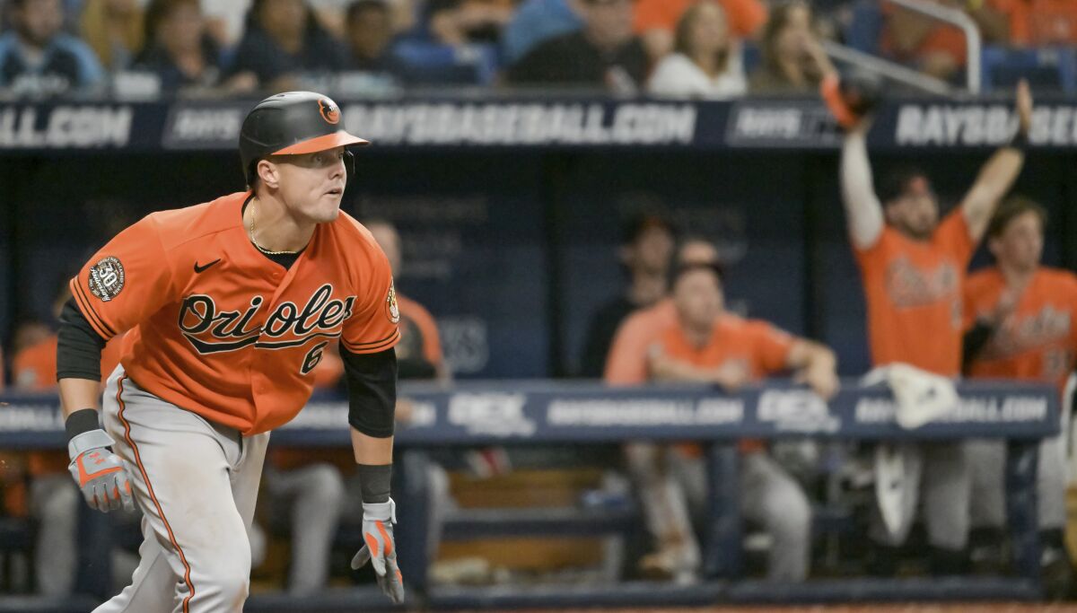 Baltimore Orioles' Ryan Mountcastle watches his two-run single to right field off Tampa Bay Rays reliever Luke Bard during the 11th inning of a baseball game Saturday, July 16, 2022, in St. Petersburg, Fla. The Orioles beat the Rays 6-4. (AP Photo/Steve Nesius)