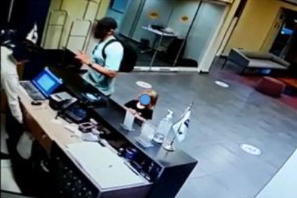 Matthew Taylor is seen here in surveillance video checking into a City Express hotel in Rosarito with his 3-year-old daughter