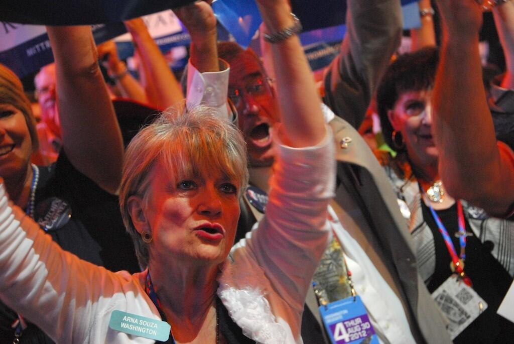 Arna Souza, of Washington state, leads a cheer at the RNC in Tampa.