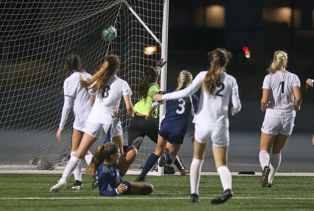 Newport Harbor's Samara Golan, not pictured, finds the upper-right corner of the net to give the Sailors a 1-0 lead in the 24th minute of the Battle of the Bay match against Corona del Mar on Thursday.
