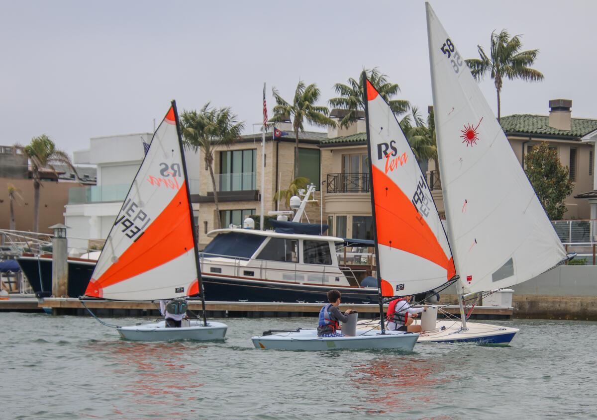 Boaters navigate Newport Harbor as part of the 87th annual Flight of Newport.