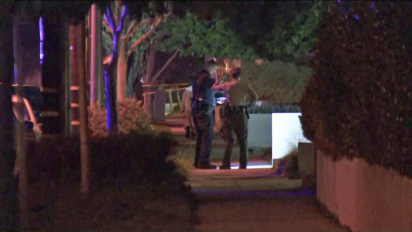 Police investigate after two people were shot and killed in Alhambra