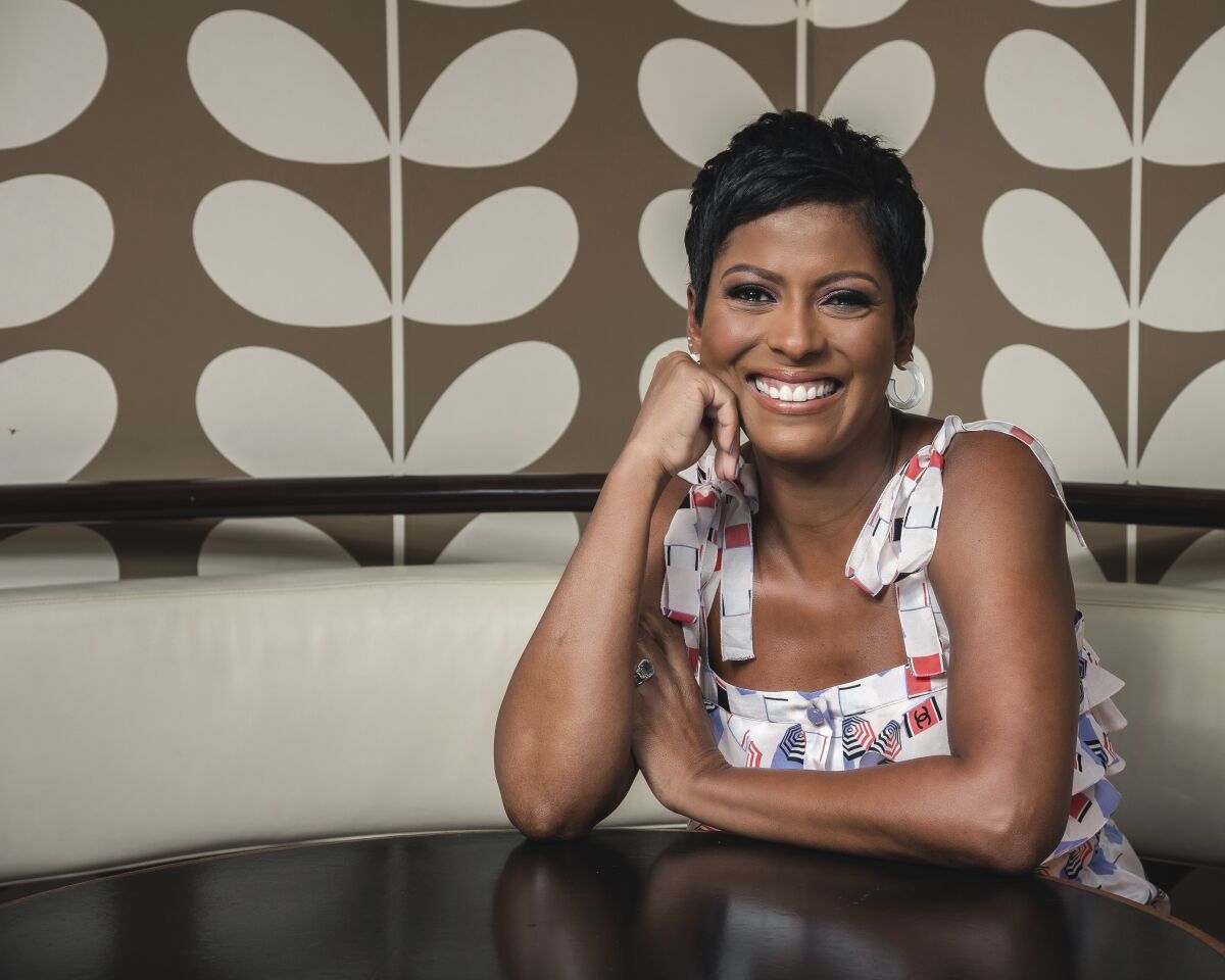 FILE - Talk Show host Tamron Hall poses for a portrait at Ruby's Vintage Harlem in New York on Aug. 8, 2019. Hall's new Court TV series, “Someone They Knew with Tamron Hall," debuts on Sunday. (Photo by Christopher Smith/Invision/AP, File)