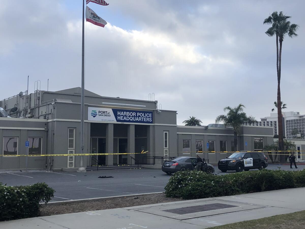 Officers shot a man who drove to Harbor Police Headquarters, requested assistance and then pulled out a gun.