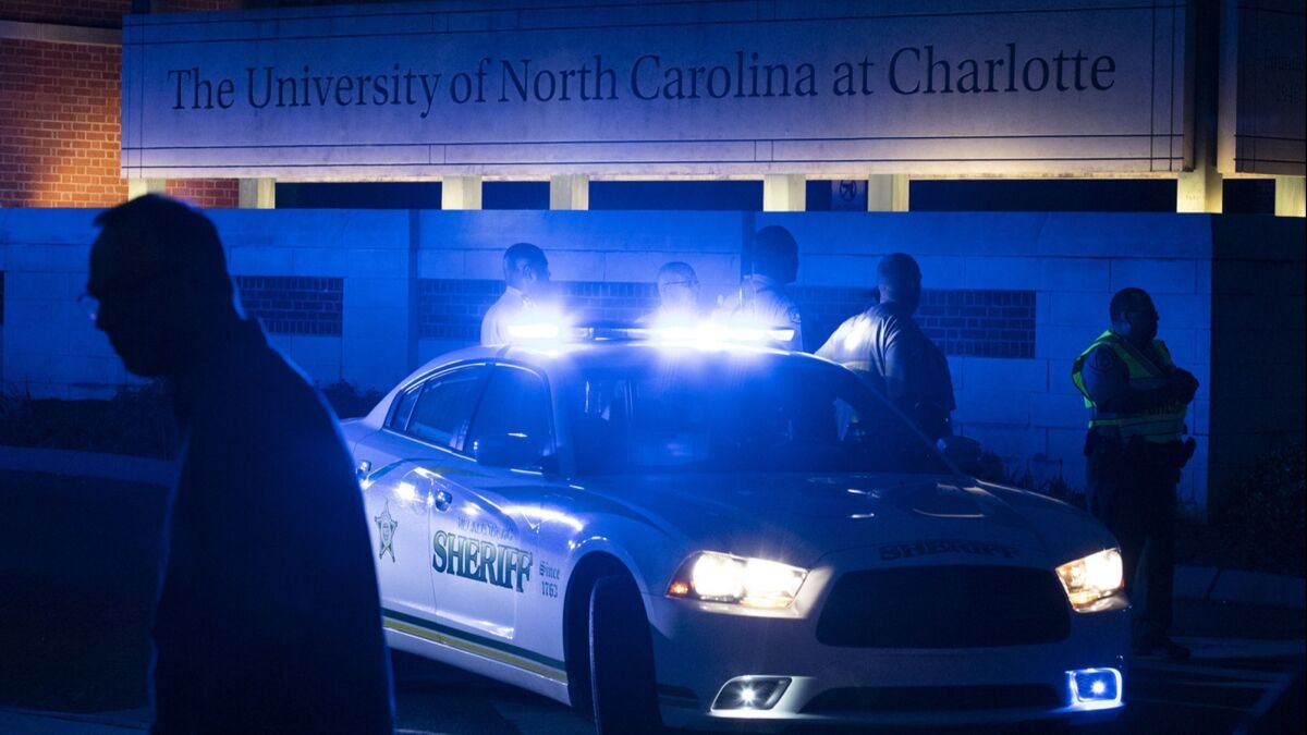 Police secure the main entrance to the University of North Carolina on Tuesday.