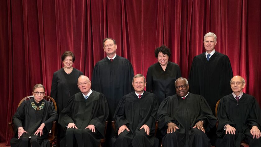 The justices of the U.S. Supreme Court gathered on Thursday for an official group portrait to include new Associate Justice Neil M. Gorsuch, top row, far right.