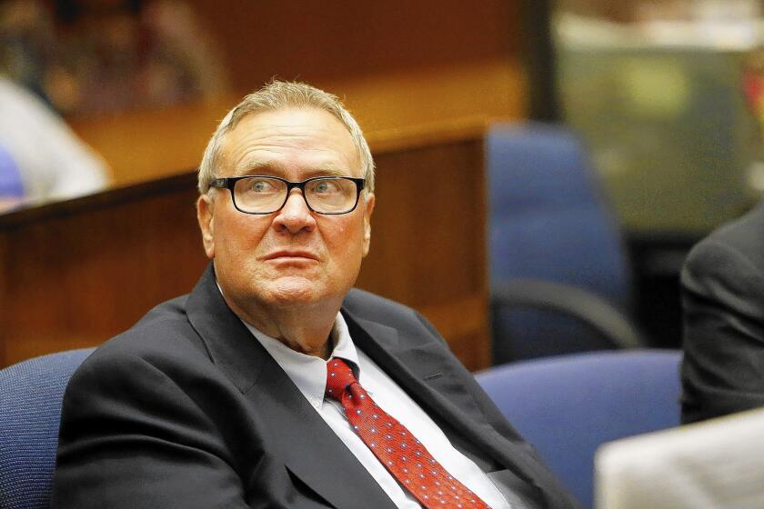 Former Bell City Councilman George Cole appears in Los Angeles County Superior Court for sentencing Wednesday. He had served on the council for 24 years.