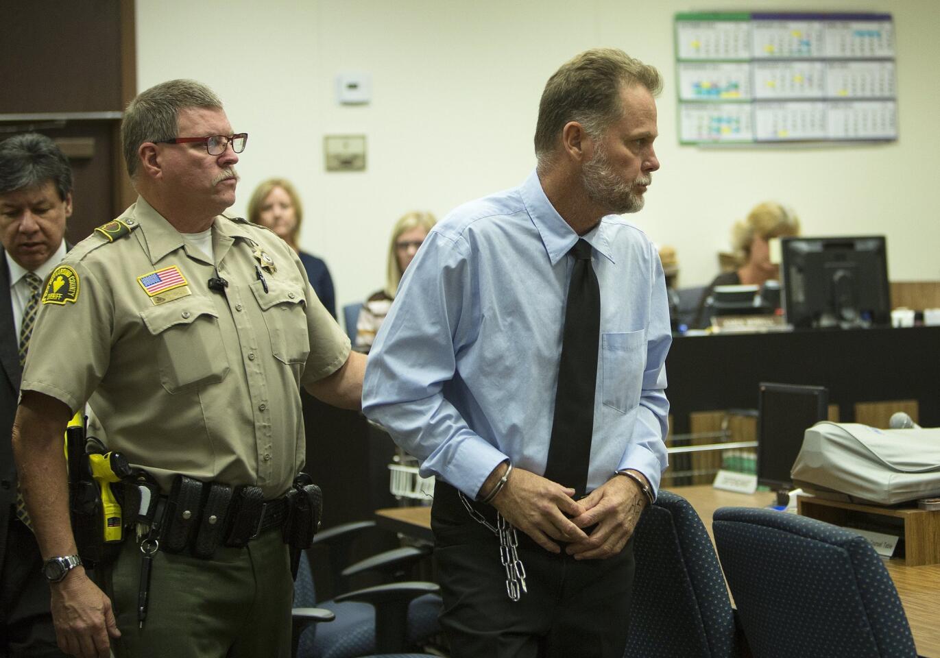 Charles Merritt is led out of the courtroom after his arraignment, where he pleaded not guilty in the slayings of the McStay family.