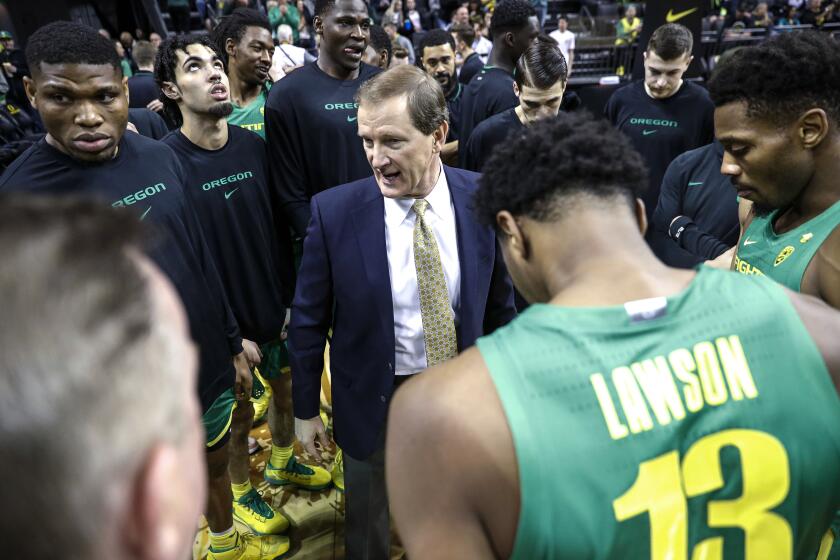 Oregon coach Dana Altman talks to the team before an NCAA college basketball game against Stanford in Eugene, Ore., Saturday, March 7, 2020. (AP Photo/Thomas Boyd)