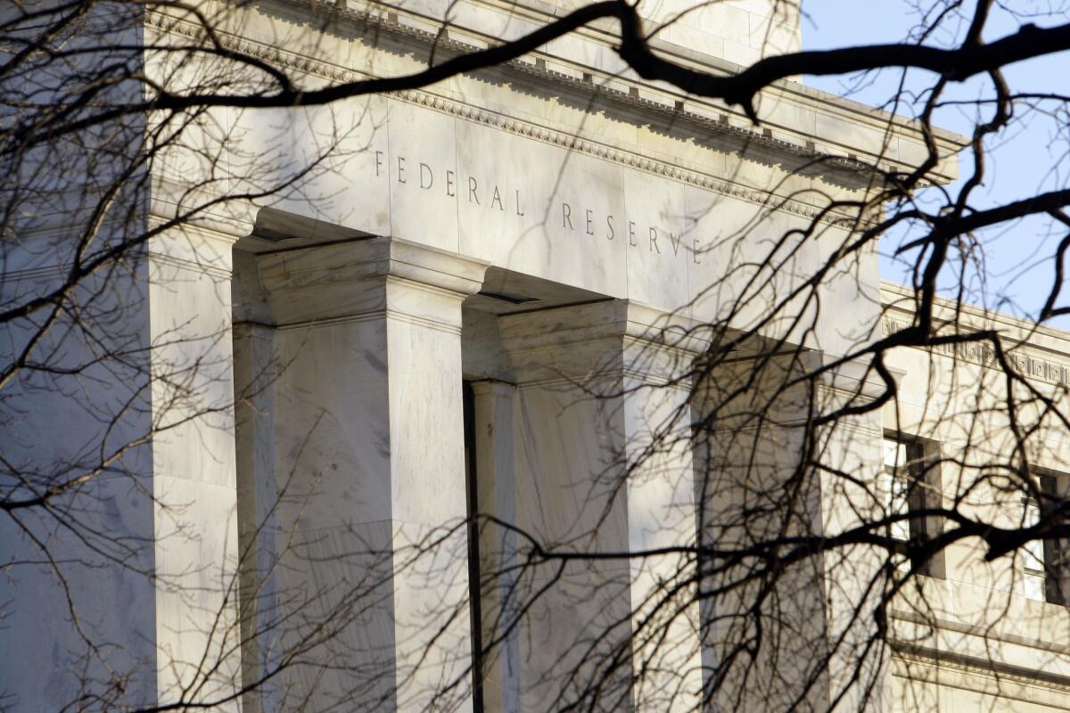 The Federal Reserve reported Wednesday that the country's economic growth in the past two months has been modest to moderate. Above, Federal Reserve headquarters in Washington.