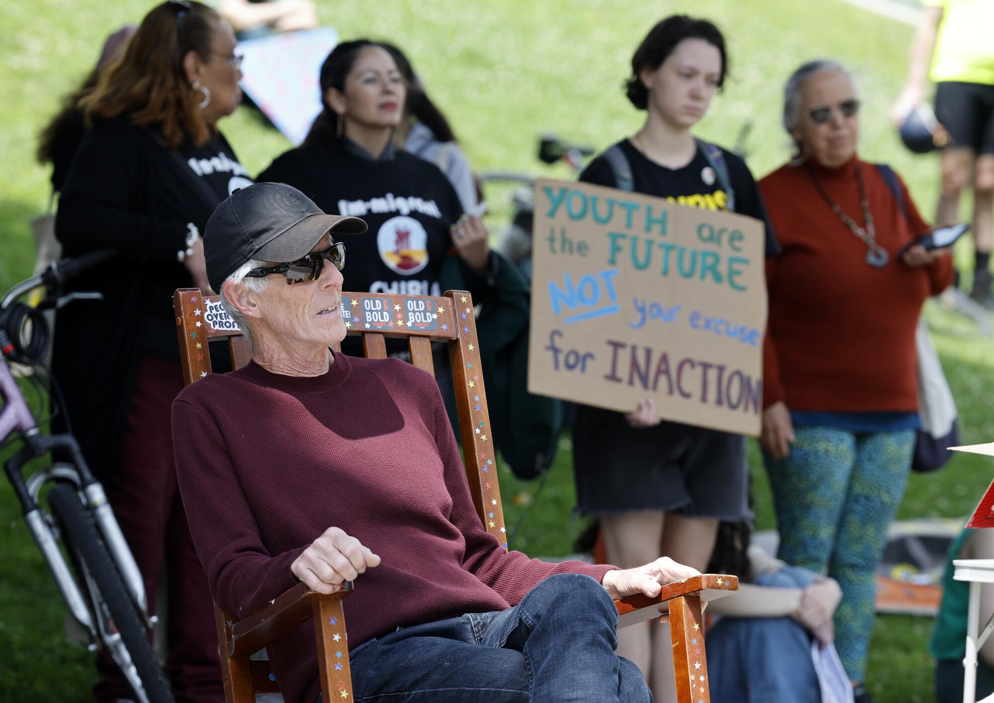 A protester in a rocking chair.